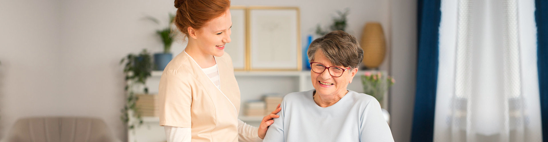 woman looking at the smiling senior woman