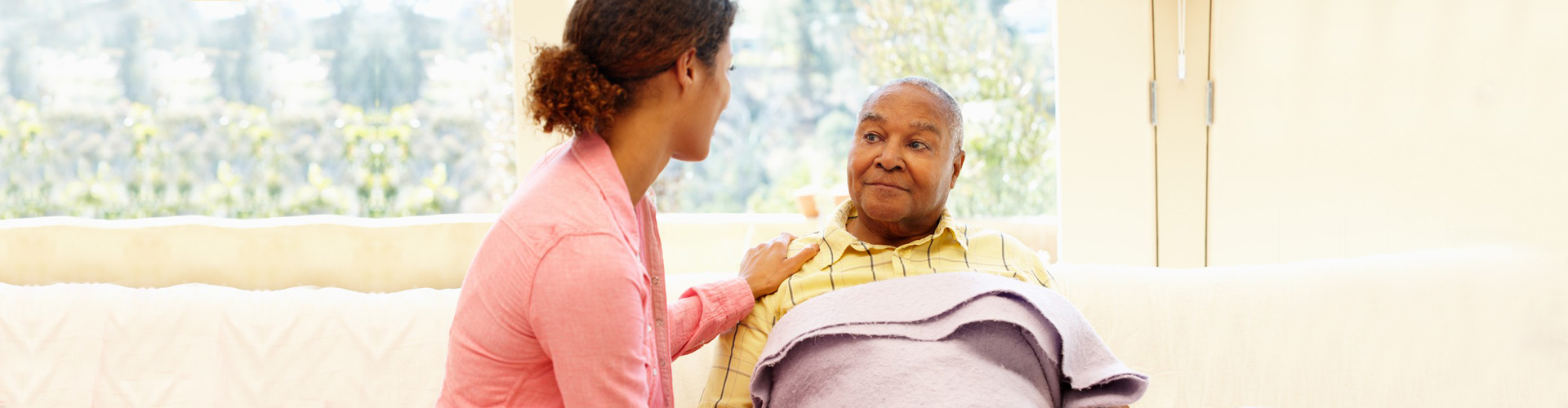 woman taking care of senior man